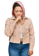 © Krakenimages.com - Hispanic woman with pink hair wearing casual clothes feeling unwell and coughing as symptom for cold or bronchitis. health care concept.