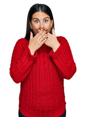 Wall Mural - Beautiful brunette woman wearing casual sweater shocked covering mouth with hands for mistake. secret concept.