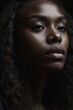 © Deivison - Profile of a black woman, black background, black history month.