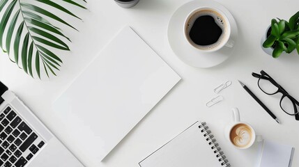 Wall Mural - Office desk with a white table featuring a blank notebook computer supplies and a coffee cup Top view with space for text Flat lay composition