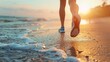 © Studio - Blurred Feet of young woman jogging on the beach Fitness female on morning run at sea shore