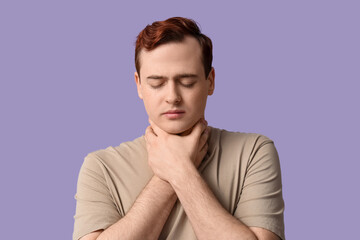 Poster - Young man with sore throat on lilac background