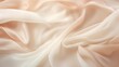 © Damerfie - Ivory silk fabric with soft folds, exuding luxury and elegance. The smooth and flowing texture makes it suitable for various applications in fashion and decor.