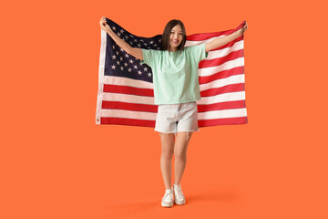 Sticker - Young Asian woman with flag of USA on orange background