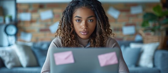 Sticker - Focused Woman Working on Laptop in a Cozy Room