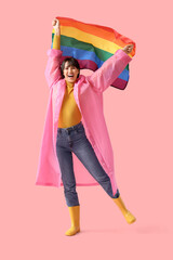 Sticker - Happy young woman with LGBT flag on pink background