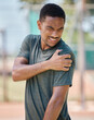 © Irshaad Majal/peopleimages.com - Fitness, man and shoulder pain by runner after exercise, training and morning run in city on blurred background. Arm injury, sport and athletic guy suffering from muscle, arthritis or cardio distress