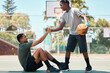 © Irshaad Majal/peopleimages.com - Basketball, sports and teamwork, helping hand and support, respect and assistance in competition training games. Happy basketball player holding hands with friend, trust and kindness on outdoor court