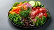 © Thamonchanok - A colorful and healthy plate of fresh salad with sliced vegetables and raw tuna, beautifully arranged on a dark background.
