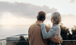 © peopleimages.com - Senior couple, back and hug with balcony for love, embrace or outdoor holiday together at home. Mature man or woman with view of nature in relax or romance for vacation or bonding on terrace at house