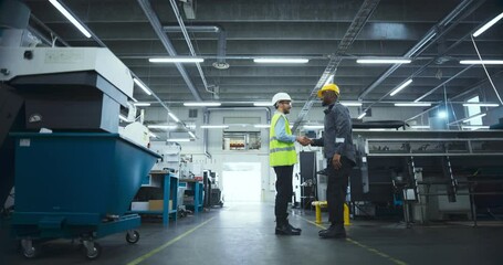 Aufkleber - Young Industrial Engineer Meeting and Shaking Hands with a Chief Production Technologist in a Modern Factory. Colleagues Met at Work Amidst Advanced Machinery and Heavy Duty Equipment
