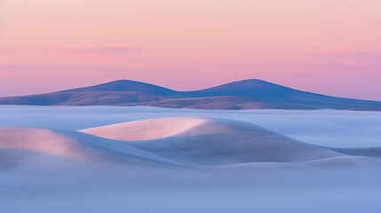 Wall Mural -   Mountain range in the distance viewed through low-lying clouds in the foreground, set against a backdrop of vibrant pink sky