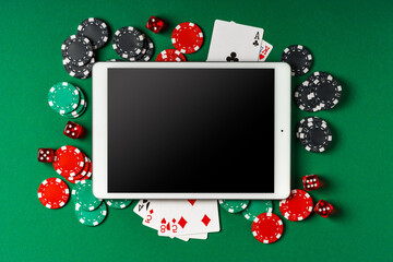 Sticker - Tablet Screen With Poker Chips, Dice, and Playing Cards on Green Felt