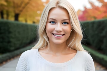 Wall Mural - A beautiful young blonde woman model with a perfect smile headshot, california girl, portrait, beauty, face, hair, eyes, lips, skin, fashion, glamour, photogenic, radiant, cheerful, happy, elegant