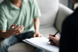 © mojo_cp - Professional psychologist conduct a consulting with sad patient in clinic