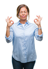 Poster - Middle age senior hispanic woman over isolated background relax and smiling with eyes closed doing meditation gesture with fingers. Yoga concept.