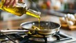 © fajar - Pouring Olive Oil into a Pan