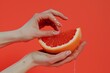© ArtSpree - Female hand close-up crushes grapefruit on a black background. Studio isolated background.. Beautiful simple AI generated image in 4K, unique.