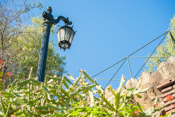 Traditional street lamp against blue sky