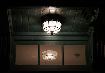 Canvas Print - Ceiling light at the entrance of the house at night