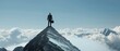 © saritwat - Businessman with briefcase on a mountain peak high