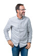 © Krakenimages.com - Handsome middle age elegant senior man wearing glasses over isolated background looking away to side with smile on face, natural expression. Laughing confident.