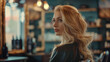 © Sawyer0 - In a hairdressing salon, a blonde model relaxes on a comfortable chair, surrounded by mirrors and lighting that highlights the beauty of her hair.