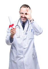 Poster - Middle age senior hoary doctor man holding degree certificate over isolated background with happy face smiling doing ok sign with hand on eye looking through fingers