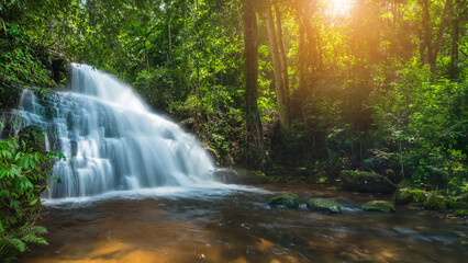 Wall Mural - Beauty in nature, amazing waterfall in tropical forest of national park, Thailand	