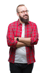 Wall Mural - Young caucasian hipster man wearing glasses over isolated background smiling looking side and staring away thinking.