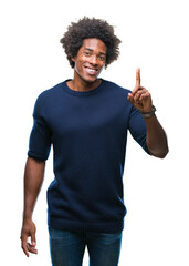 Poster - Afro american man over isolated background pointing finger up with successful idea. Exited and happy. Number one.