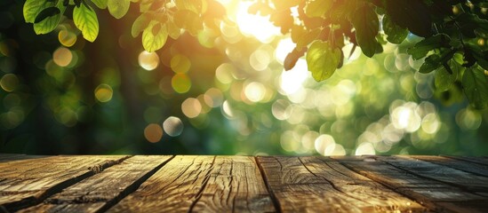Poster - Morning sunlight and green bokeh illuminate a wooden table with space for product display set against a blurred natural backdrop. with copy space image. Place for adding text or design
