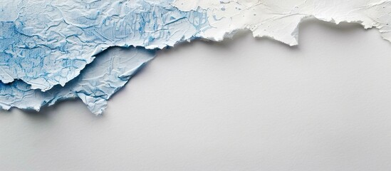 Poster - White and blue rice paper with torn edges on white background with copy space image