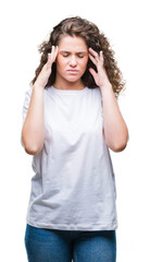 Wall Mural - Beautiful brunette curly hair young girl wearing casual t-shirt over isolated background with hand on head for pain in head because stress. Suffering migraine.