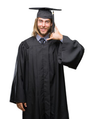 Sticker - Young handsome graduated man with long hair over isolated background smiling doing phone gesture with hand and fingers like talking on the telephone. Communicating concepts.