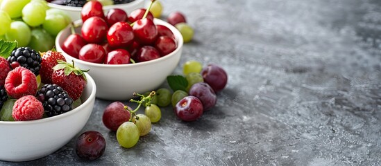 Aufkleber - Copy space image featuring an assortment of fresh berries such as cherry raspberry strawberry blackberry gooseberry mulberry and grapes in decorative bowls