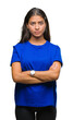 © Krakenimages.com - Young beautiful arab woman over isolated background skeptic and nervous, disapproving expression on face with crossed arms. Negative person.