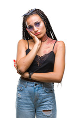 Poster - Young braided hair african american with birth mark wearing sunglasses over isolated background thinking looking tired and bored with depression problems with crossed arms.