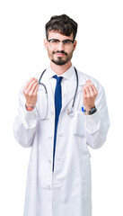 Wall Mural - Young doctor man wearing hospital coat over isolated background Doing money gesture with hand, asking for salary payment, millionaire business