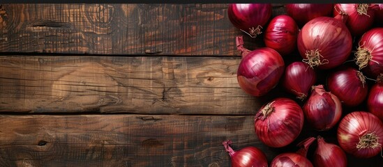 Aufkleber - Red onions arranged beautifully on a wooden surface providing ample copy space image for your content