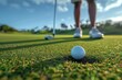 © Oksana - Golf ball on the green with a player in the background.