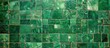 © vxnaghiyev - A mosaic of green tiles creating a textured pattern with copy space image