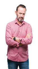 Poster - Middle age hoary senior man over isolated background skeptic and nervous, disapproving expression on face with crossed arms. Negative person.