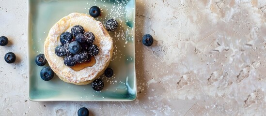 Aufkleber - Blueberries and icing sugar top Japanese style pancakes on a square green plate with a heart shaped jam creating a delicious breakfast scene against a light background Ample copy space for text or des