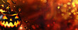 © Александр Довянский - Halloween background, glowing pumpkins and bokeh lights on orange blurred background, copy space