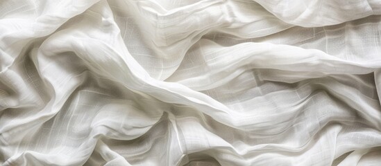 Poster - top view of a white crumpled linen fabric texture background resembling natural organic eco textiles