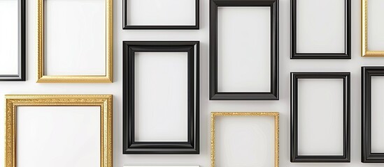 Canvas Print - Modern luxury decoration with empty gold and black picture frames against a white wall ideal for displaying photos or text with copy space image designing