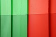 © StockUp - Colorful wall with green and red paint divided symmetrically, highlighting the texture and vibrant hues.