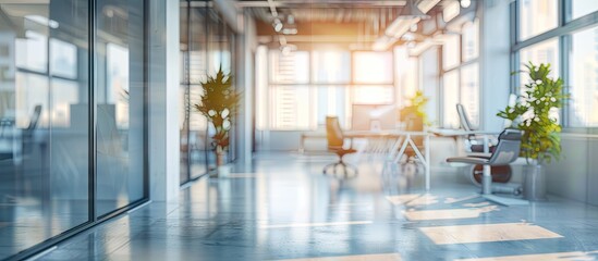 Canvas Print - Blurry and unfocused backdrop in an empty office with glass windows for a copy space image