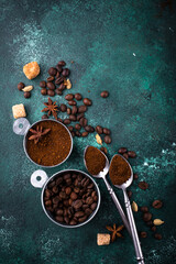 Wall Mural - Grounded coffee, beans, coffe maker and spicces